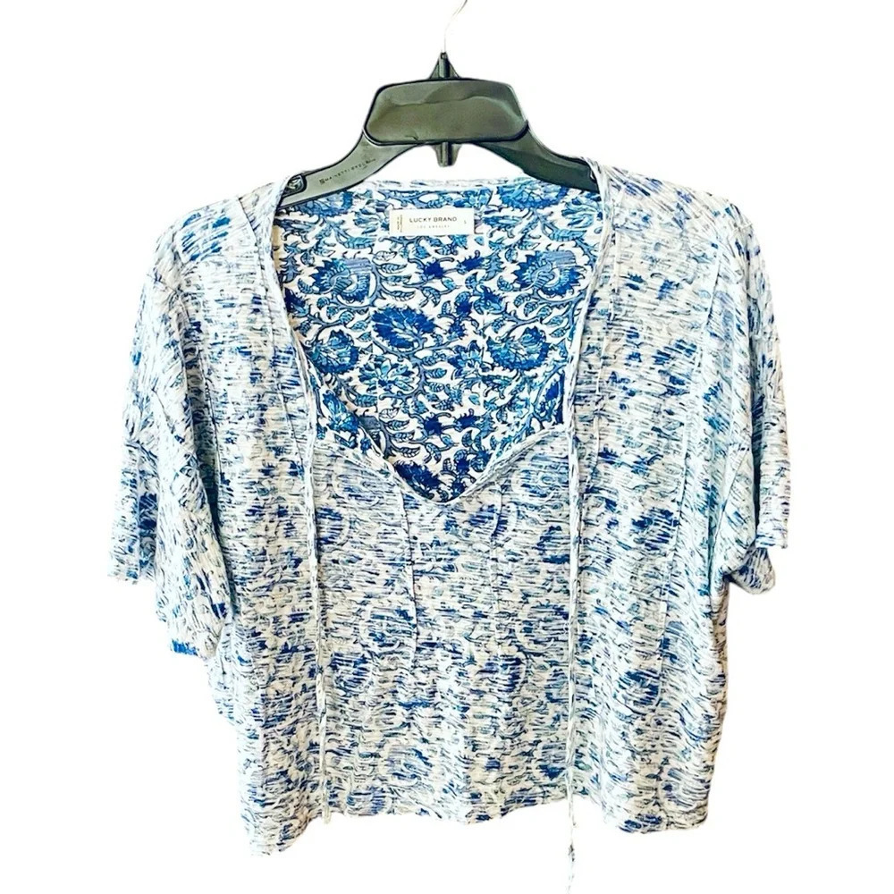 Lucky Brand women’s cropped flutter sleeve inside-out floral top SZ S blue white